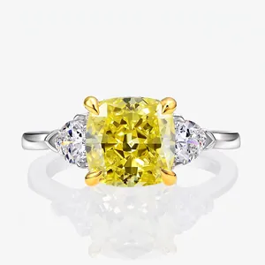 Square cushion cut yellow gemstone ring with pear side stones on silver band
