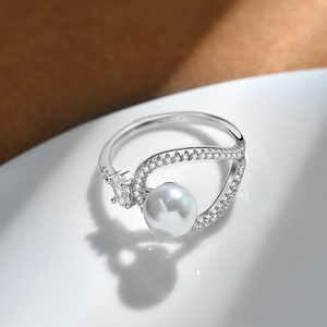 925 sterling silver pearl ring with sparkling zircon in a cross-curve design