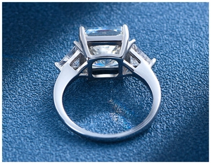 Macro view of 925 sterling silver ring featuring hollow base and three-stone setting