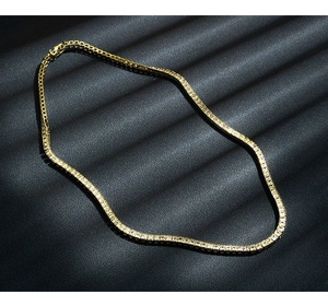 Detailed view of 4mm gold plated 925 silver tennis necklace with sparkling zircons