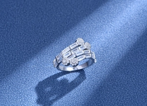 Macro detail of S925 silver multi-layer ring with rectangular and round pavé diamonds