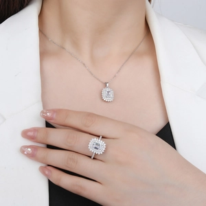 S925 silver jewelry set with emerald cut green gemstones and halo diamond accents