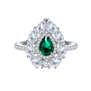 S925 silver ring featuring a teardrop-shaped green emerald and white zircon halo