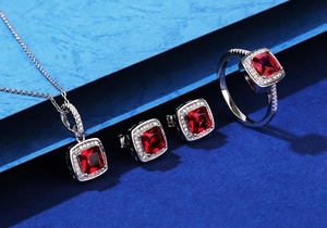 Macro shot of S925 sterling silver jewelry set featuring square red synthetic ruby stones