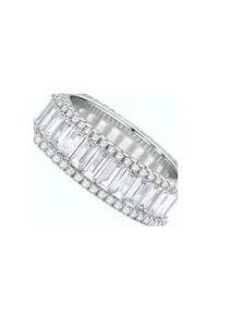 Detailed macro view of baguette and round cut stones in a silver eternity band ring