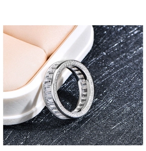 Macro shot of S925 sterling silver eternity ring with baguette cut cubic zirconia stones