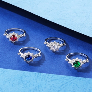 Four-prong S925 silver rings with colorful round gems and snowflake halo accents