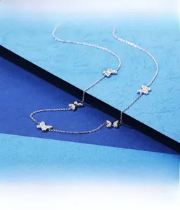 Close-up of S925 silver butterfly necklace featuring fine micro-pave setting detail
