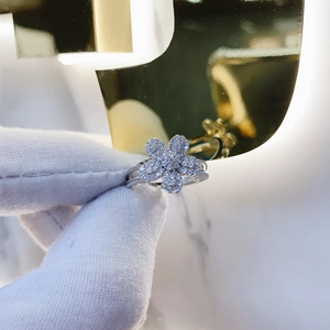 Detailed view of 925 silver ring featuring micro-pave cubic zirconia on flower petals