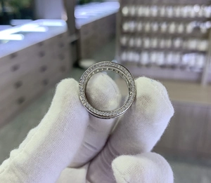 Close-up of S925 sterling silver ring with pavé-set rectangular cubic zirconia diamonds