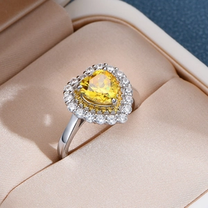 925 sterling silver ring with heart shaped yellow gem and double halo diamonds