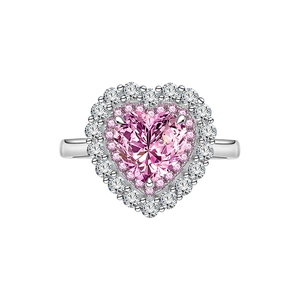 925 sterling silver ring featuring a pink heart-cut center stone with halo accents
