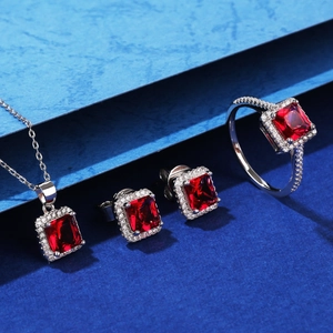 Classic S925 silver jewelry set featuring emerald-cut red rubies and halo diamond accents