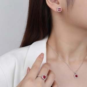 Elegant S925 sterling silver jewelry set with red synthetic ruby ring, necklace, and earrings