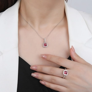 Elegant S925 silver jewelry set with square red gemstone necklace and ring on a model