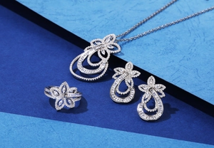 Detailed set of floral teardrop S925 silver jewelry with cubic zirconia stones