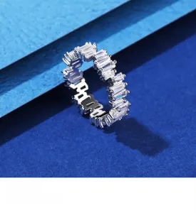 Macro view of the S925 silver ring featuring baguette-cut zircon stones and layered plating