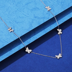 Minimalist S925 sterling silver necklace featuring five sparkling butterfly pendants