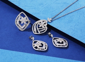 Macro shot of S925 silver flower jewelry set with rhombic pavé cubic zirconia