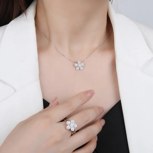 Elegant 925 sterling silver micro-set flower necklace and ring set on model