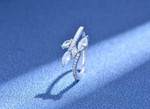Macro view of S925 silver leaf ring with marquise-cut zircon and pave-set detailing