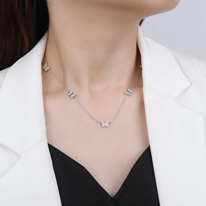 Elegant S925 sterling silver butterfly necklace featuring five zircon-inlaid pendants