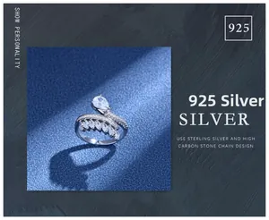 Detail of 925 sterling silver wrap ring with pear-cut and marquise zircons