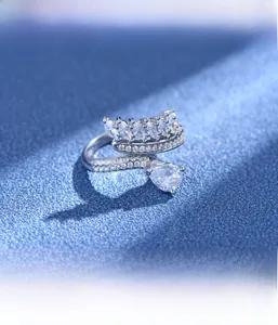 Detail of cross silver ring with marquise cut stones using microscopic inlay technique