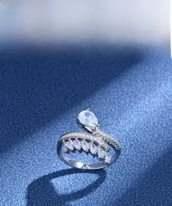 Detailed view of 925 silver feather ring featuring a teardrop main stone and 5A zircon
