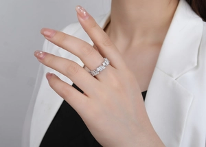 Detailed close-up of S925 sterling silver ring with trapezoidal baguette-cut diamonds