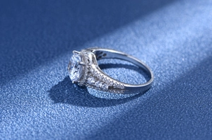 Macro side view of 8mm round zircon ring with 925 silver pave setting and hollow band detail