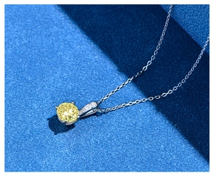 Macro shot of 7mm yellow carbon diamond necklace with S925 silver four-claw setting