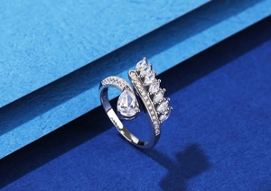 Close-up of S925 sterling silver feather ring with teardrop and marquise cubic zirconia