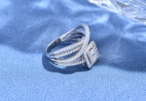 Macro shot of silver S925 multi-layered interlocking ring with micro-pave crystals