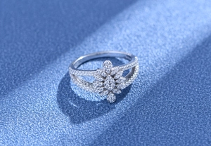 Macro detail of S925 sterling silver ring featuring intricate floral micro-pave diamond setting