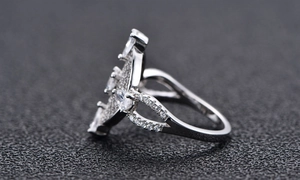 Macro side view of S925 sterling silver ring with pavé-set marquise and round zircon gems