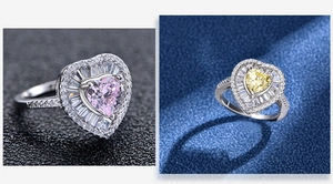 Detail of 925 silver rings featuring heart-shaped pink and yellow gemstone centers