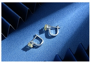 Close-up of S925 silver hook earrings with 7mm yellow carbon diamond and micro-pave setting