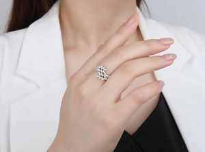 Macro shot of a double-row leaf ring in 925 silver with sparkling cubic zirconia pavé