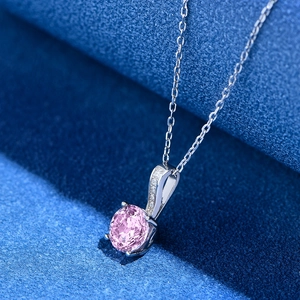 925 silver necklace with 7mm pink oval cut diamond pendant on dark background
