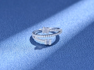 Macro shot of silver triple-layered pave wrap ring with dual rectangle cubic zirconia