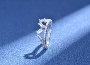Macro view of a 925 sterling silver crown ring with baguette cut zircon stones