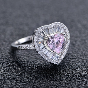 Elegant 925 silver heart ring featuring a 7mm pink main stone with halo diamond accents