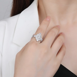 Elegant S925 sterling silver oval ring with micro-pave diamonds worn by model