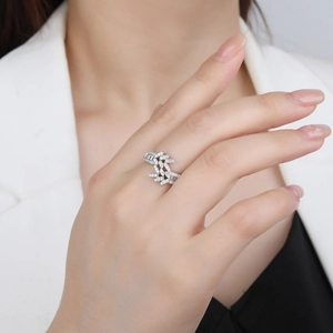 925 sterling silver ring with double row of pavé set leaves on female model hand