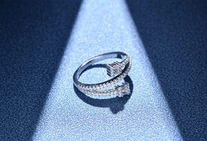 Macro shot of S925 silver ring featuring triple-layer lines and micro-pave zirconia stones