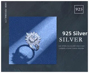 Macro detail showing 925 silver sunburst ring with Asscher cut center stone and marquise diamonds
