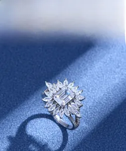 Detailed macro view of Asscher cut main stone and marquise zircon halo on 925 silver ring