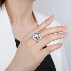 Luxury S925 sterling silver floral ring with sparkling pavé diamonds on model hand