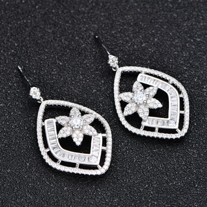 Sparkling S925 silver rhombic flower earrings with micro-paved cubic zirconia on black base